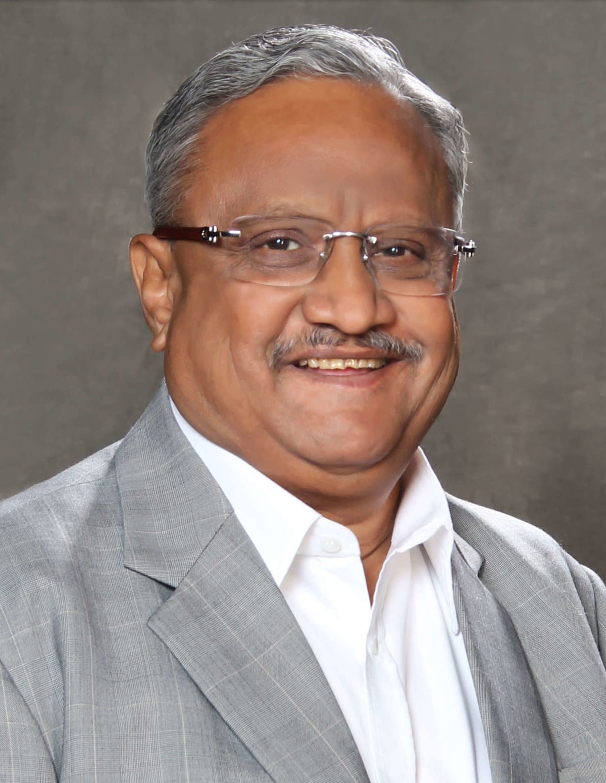 Shri Amrishbhai Patel